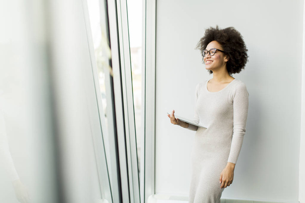 Young African American businesswoman in office - 写真・画像