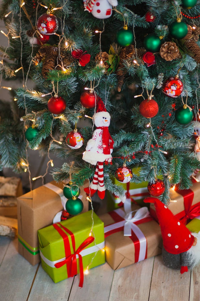 Christmas gifts on the background of trees - Photo, image