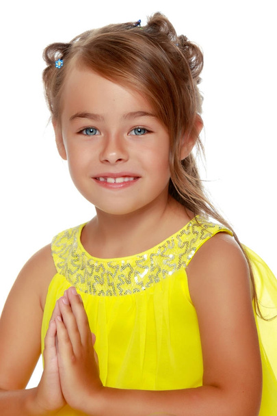 Fashionable little girl in a dress - Valokuva, kuva