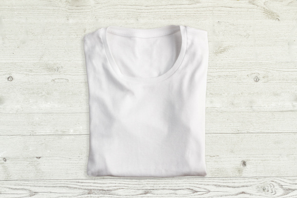 White folded t-shirt  - Foto, Imagen