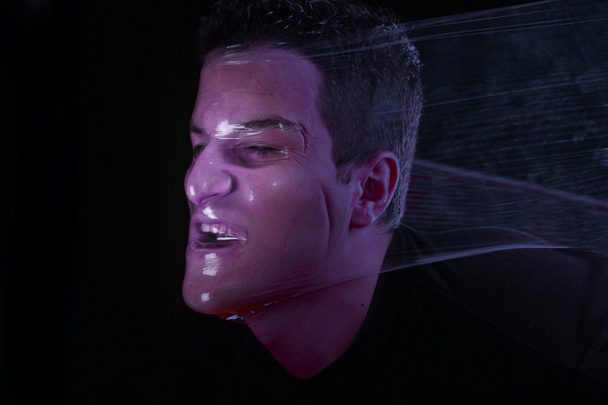 plastic man gezicht abstract - Foto, afbeelding