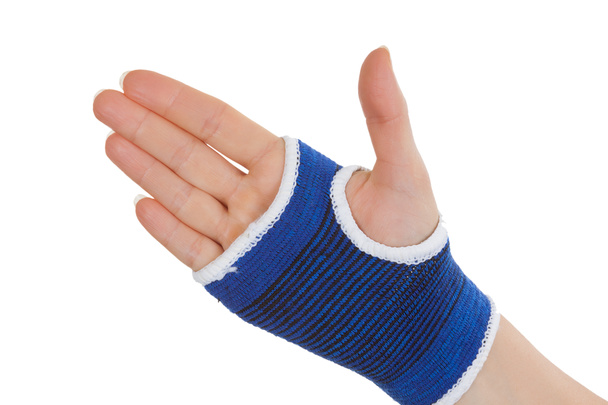 Frau Hand in Bandage Handstütze gewickelt - Foto, Bild
