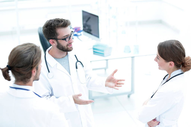 Group of doctors talking - Фото, изображение