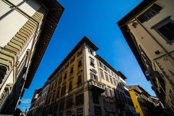 Florence, Italy - October, 2017. Narrow street in Florence, Tuscany, Italy. Architecture and landmark of Florence. - 写真・画像