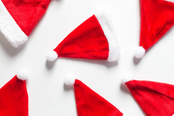 Papai Noel chapéus plana leigos tema de Natal
 - Foto, Imagem