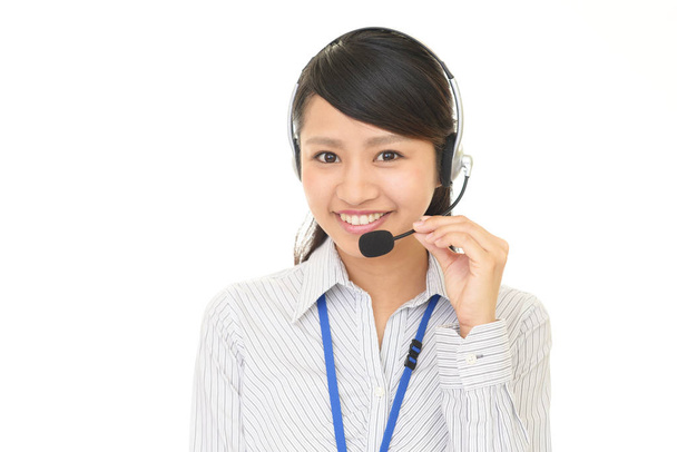 Operatore di call center sorridente
 - Foto, immagini