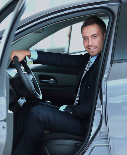 Young businessman sitting in the car - Φωτογραφία, εικόνα