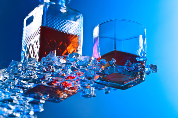 Glass of Whiskey with ice. - Zdjęcie, obraz