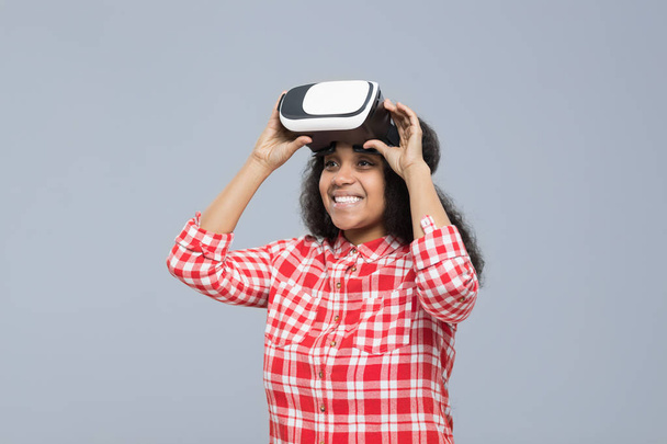 Young Woman Wear Virtual Reality Digital Glasses African American Girl Happy Smile - Фото, зображення