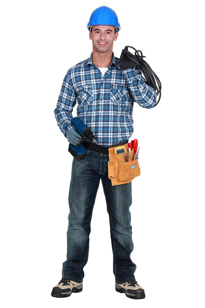 Craftsman with tools and hand drill - Photo, image