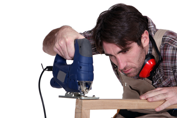 Carpenter using a jigsaw - Foto, Imagem