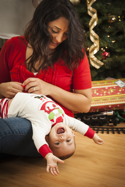 Ethnic Woman With Her Mixed Race Baby Christmas Portrait - Photo, Image