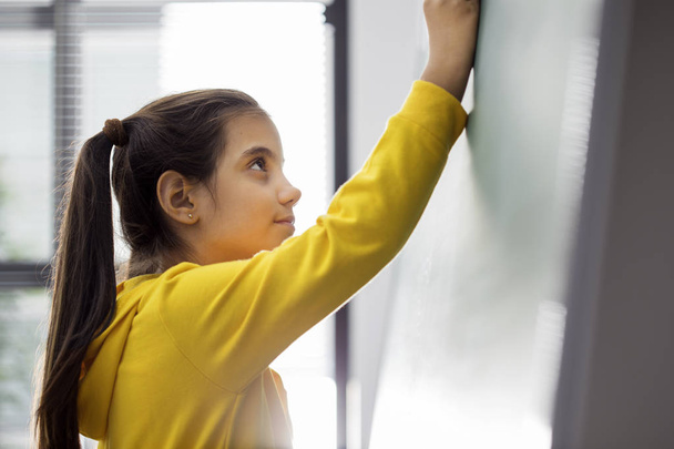 School child writing blackboard - Фото, зображення