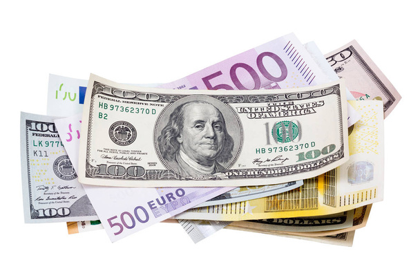 Fehér alapon elkülönített dollár és eurobankjegyek. - Fotó, kép