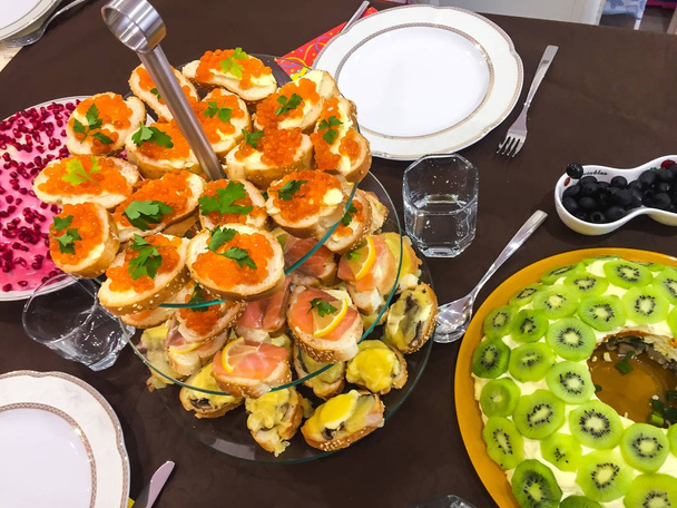 Bruschetta with caviar or salmon on  buffet table - Photo, Image