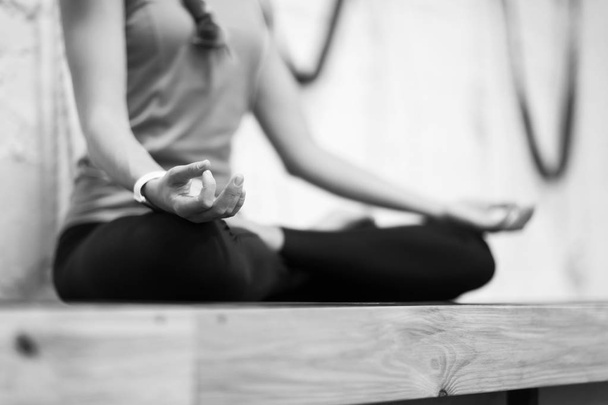 Woman Doing Yoga Exercises In Gym, Closeup Sport Fitness Girl Sitting Lotus Pose - Φωτογραφία, εικόνα