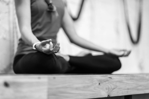Woman Doing Yoga Exercises In Gym, Closeup Sport Fitness Girl Sitting Lotus Pose - Foto, immagini