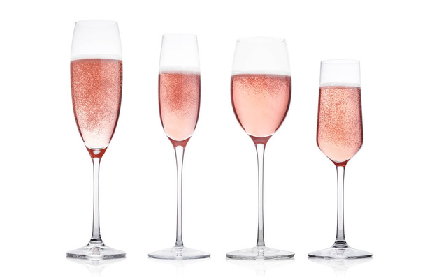 Champagne rose glasses with bubbles on white - Fotoğraf, Görsel