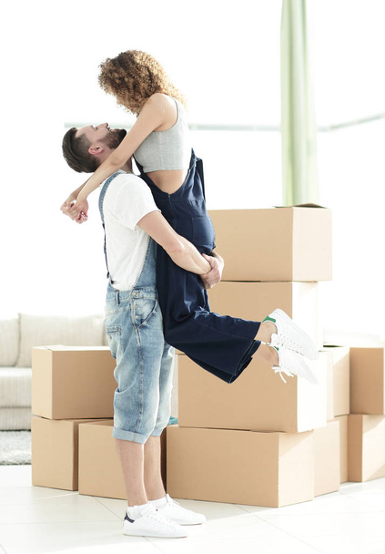 Portrait of a happy couple moving to a new house - Zdjęcie, obraz