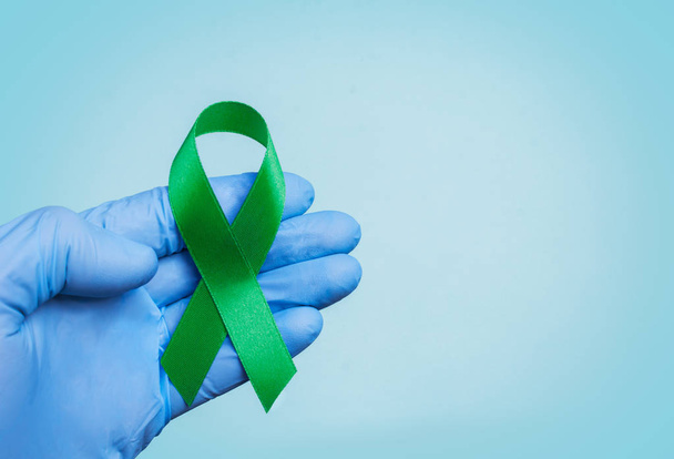 Lenfoma kanseri ve ruh sağlığı bilinirliğini için yeşil şerit kireç - Fotoğraf, Görsel