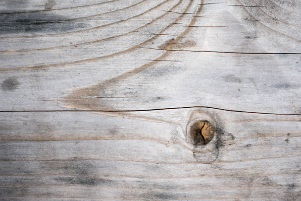 Rustieke, verweerde houten achtergrond met knopen - Foto, afbeelding