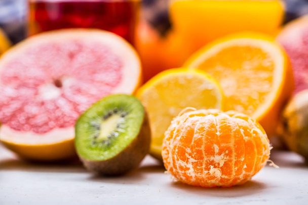 Citrus fresh fruit. Mandarin tangerine Orange grapefruit lemon lime with mint leaves - Foto, immagini