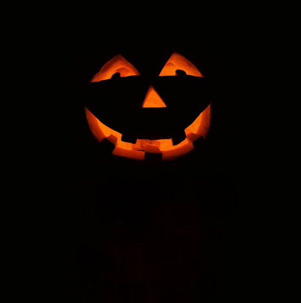 Halloween pumpkin lantern with black background - 写真・画像