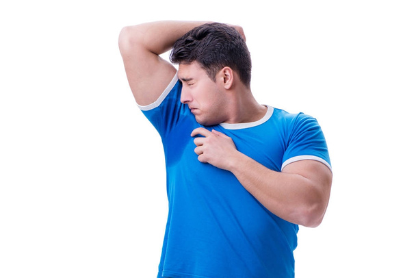 Man sweating excessively smelling bad isolated on white backgrou - Foto, immagini