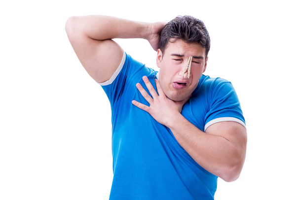 Man sweating excessively smelling bad isolated on white backgrou - Photo, Image