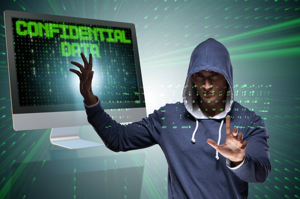 Hooded hacker in data computer security concept - Photo, Image