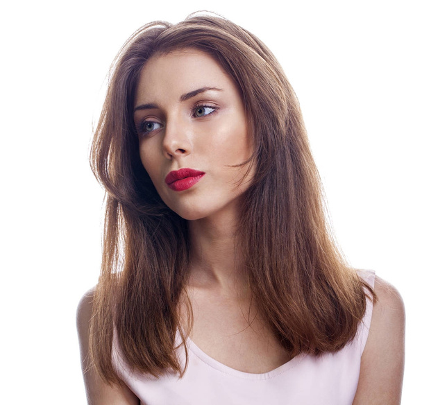 Closeup portrait of a beautiful young brunette woman - Foto, afbeelding