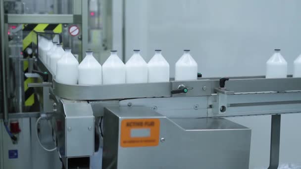 Robotized Machine packaging Bottles - Footage, Video