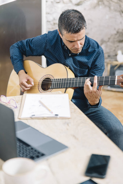 man who studied music with guitar - Photo, Image