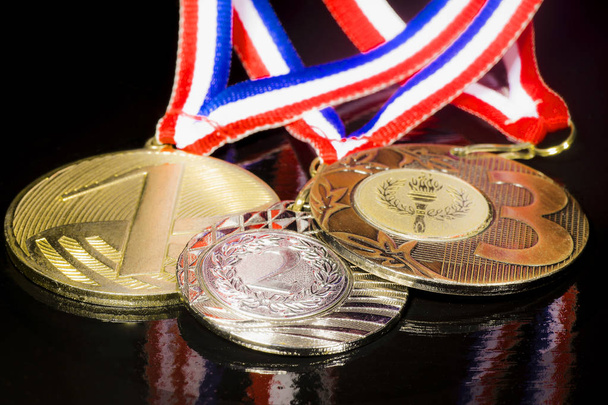 Medals on the black background  - Φωτογραφία, εικόνα