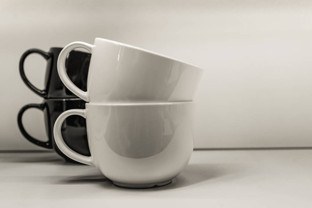 Two mugs on a white background are standing.  - 写真・画像