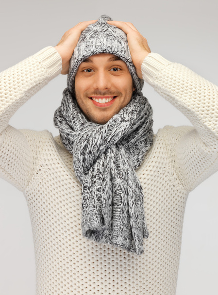 handsome man in warm sweater, hat and scarf - Фото, зображення