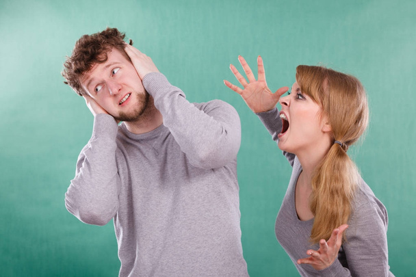 Aggressive woman yelling on man. - Фото, зображення