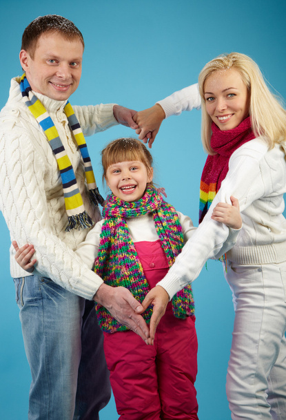 Perhe talvivaatteissa
 - Valokuva, kuva