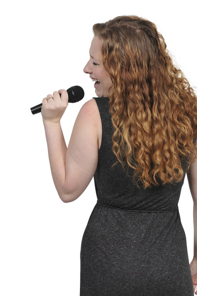 Young Woman Singer - Фото, изображение