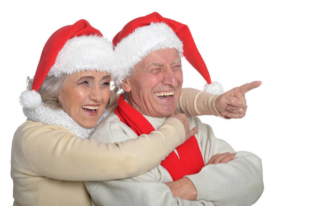 Senior couple in Santa hats - Φωτογραφία, εικόνα