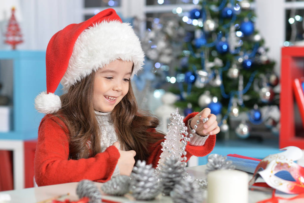 little girl preparing to Christmas  - Zdjęcie, obraz