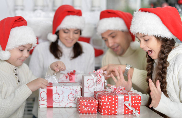 Family in Santa hats - Foto, Imagen