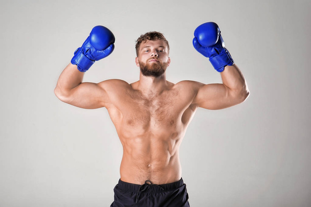 Male boxer on background - Foto, imagen