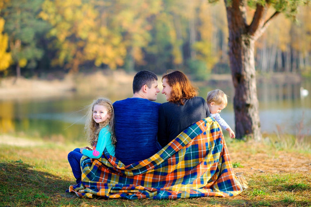 happy family in beautiful park - Фото, изображение