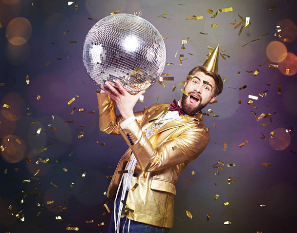 Man with disco ball cheering  - Photo, image