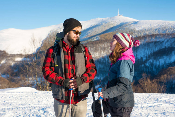 Couple of hikers exploring snowy mountain - Fotografie, Obrázek