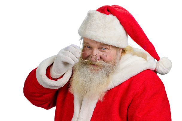 Santa Claus removing his glasses. - Photo, Image