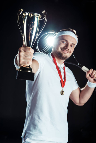 tennis player with champion goblet - Photo, Image