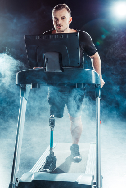 paralympic sportsman exercising on treadmill  - Valokuva, kuva