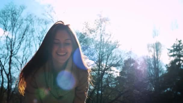 stylish red-haired girl stands on a forest or park in autumn. - Metraje, vídeo